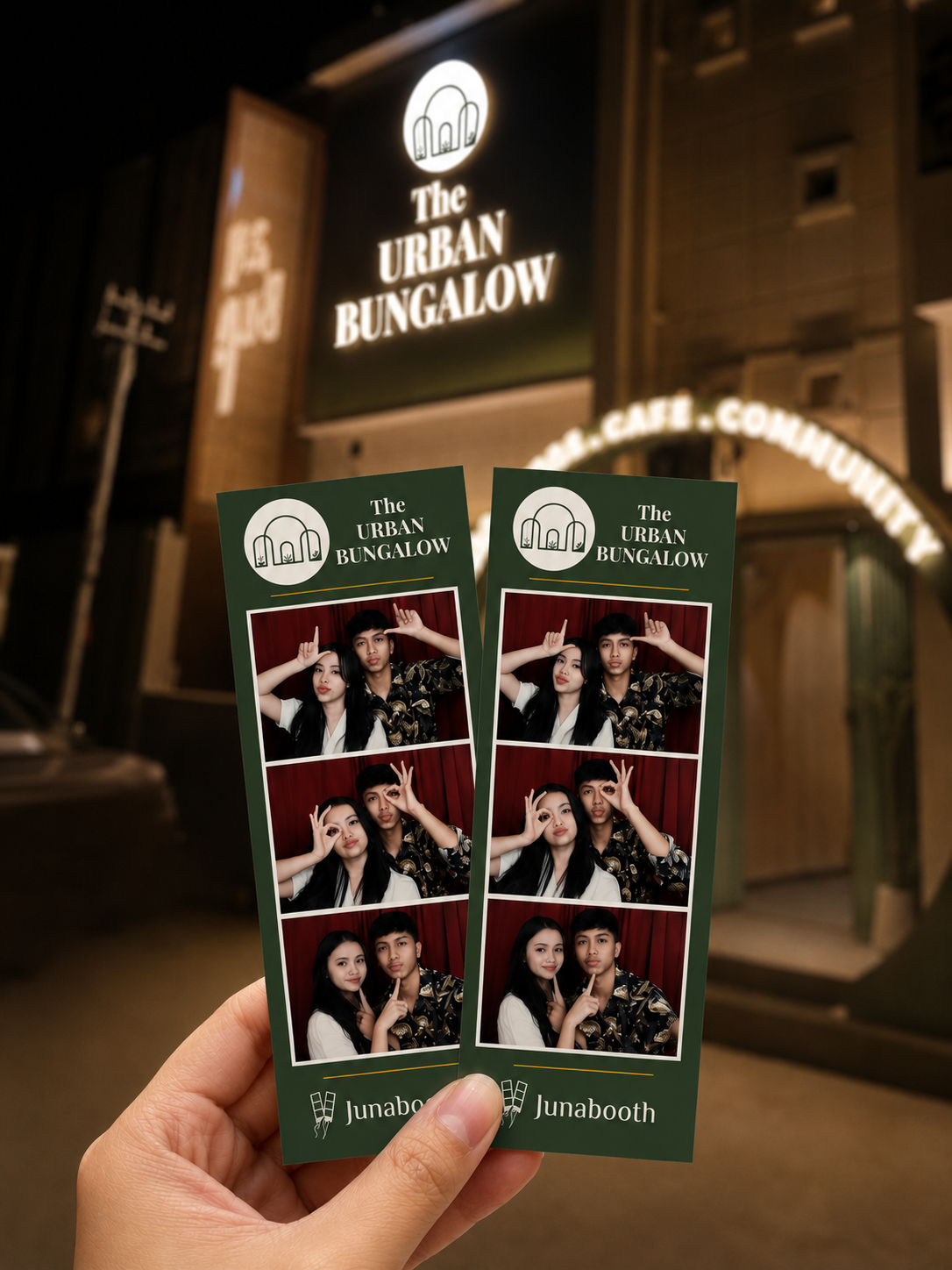 Guests holding The Urban Bungalow photo strip